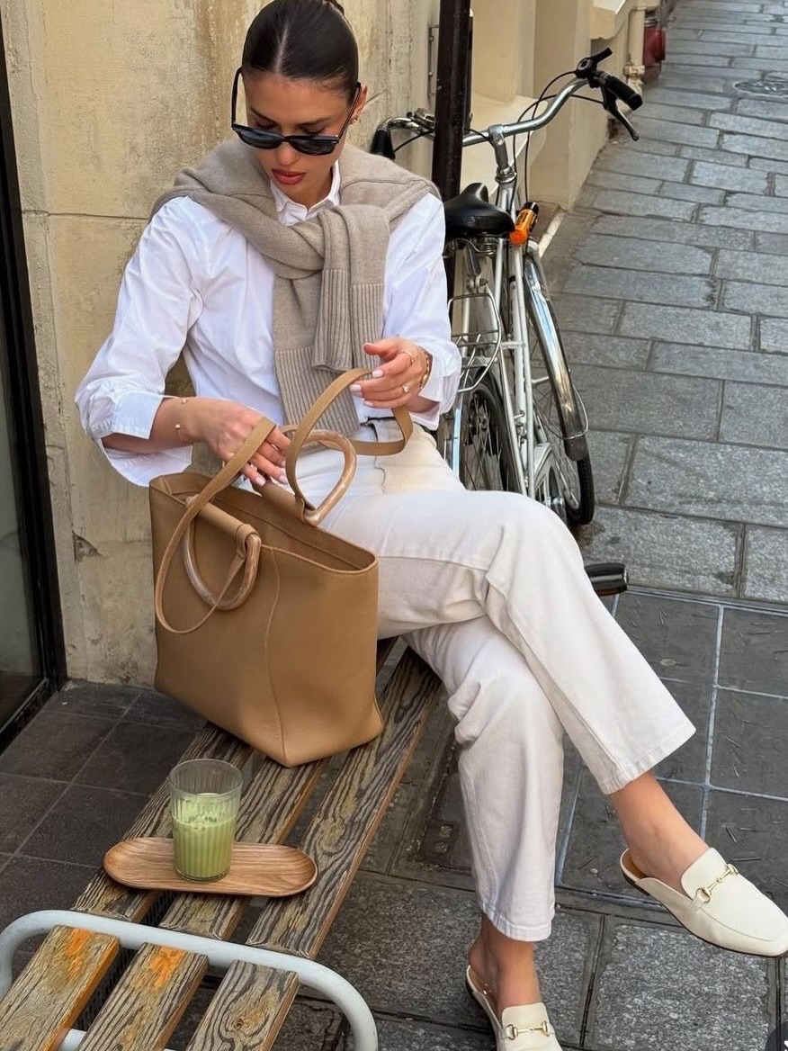A White Shirt and Cream Trousers with a Soft Sweater Layer