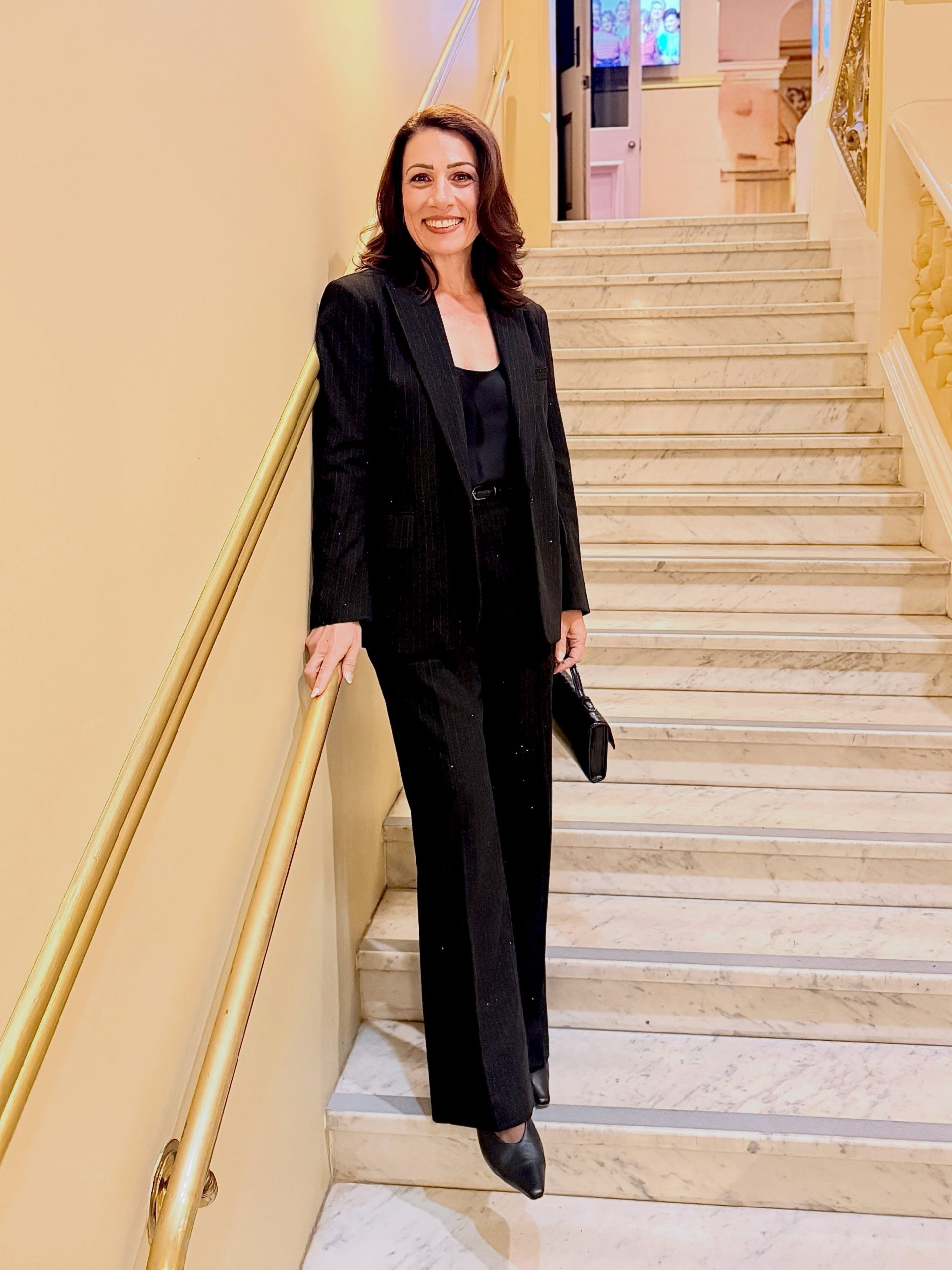 A Classic Black Trouser Suit for Confident Evening Tailoring