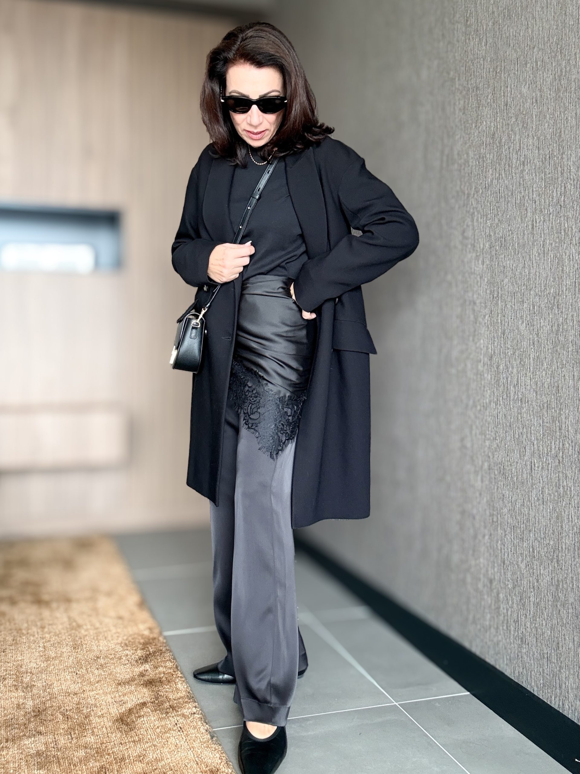 Black Layers and Gray Satin Pants for a Textured Monochrome Look